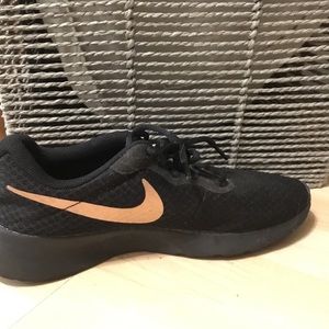 Black and rose gold Nike’s